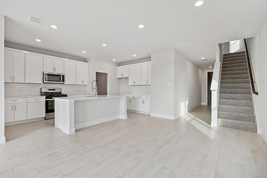 Furnished interior view inside a new home in Venetian, Weston (Image 7).