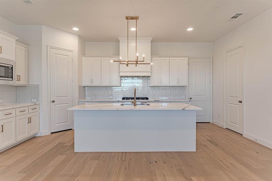 Furnished interior in a model home at Walsh Townhomes in Aledo (Image 14). Furnished interior in a model home at Walsh Townhomes in Aledo (Image 14).