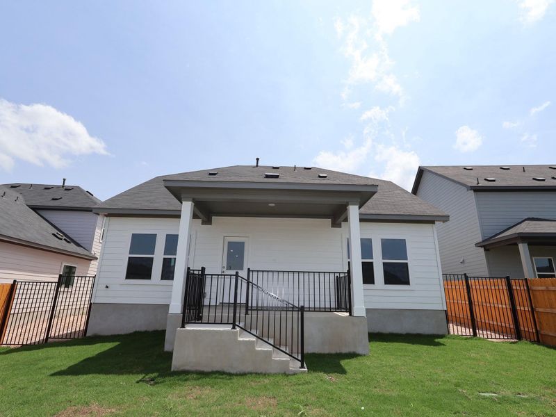 Exterior details and patio area of a home in Cascades at Onion Creek, Austin (Image 3).