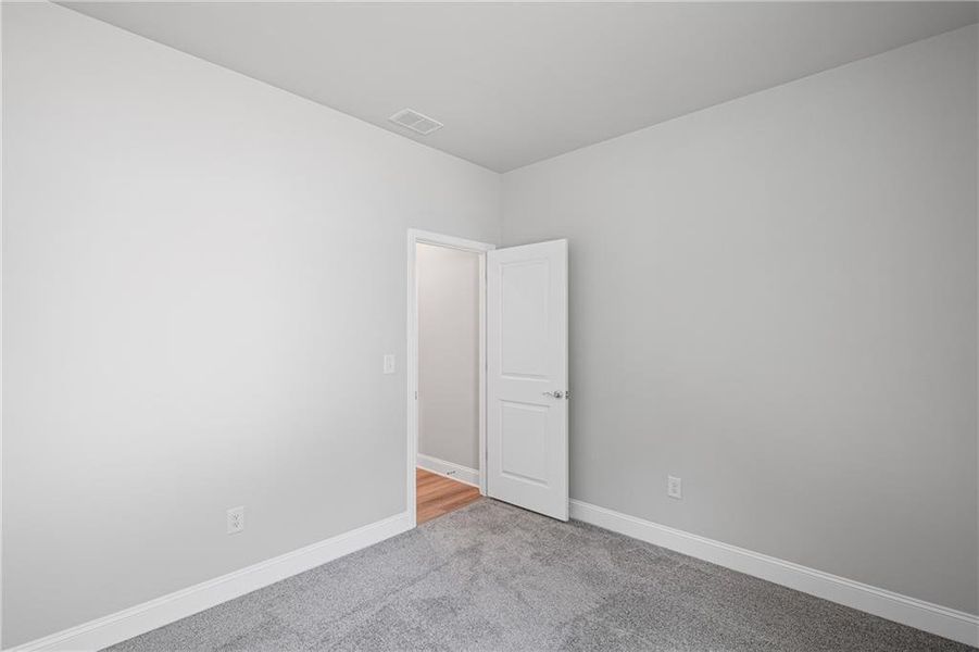 Spacious, unfurnished interior of a new home in Sun City Peachtree, Griffin (Image 18).