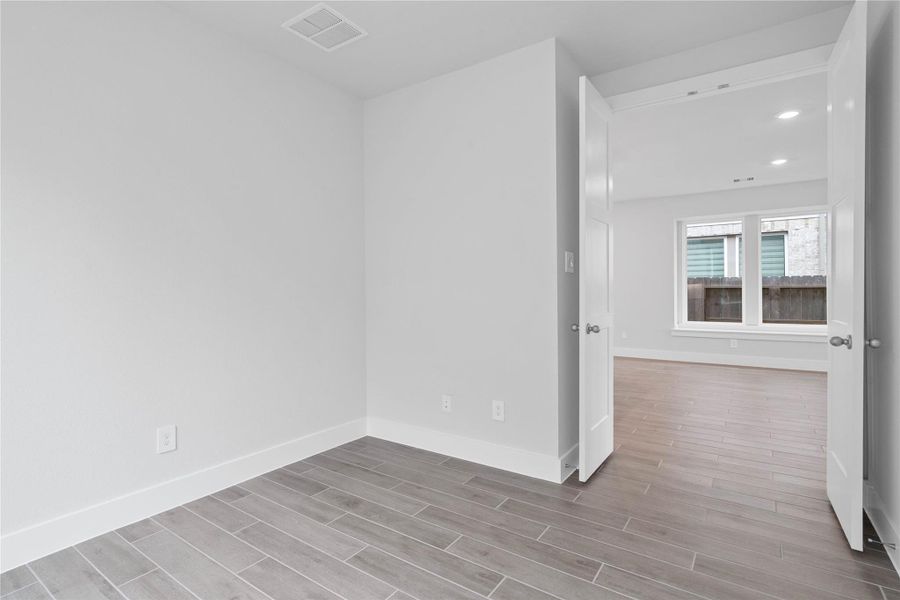 Additional view from the Study looking out towards the dining area and featuring the double doors.