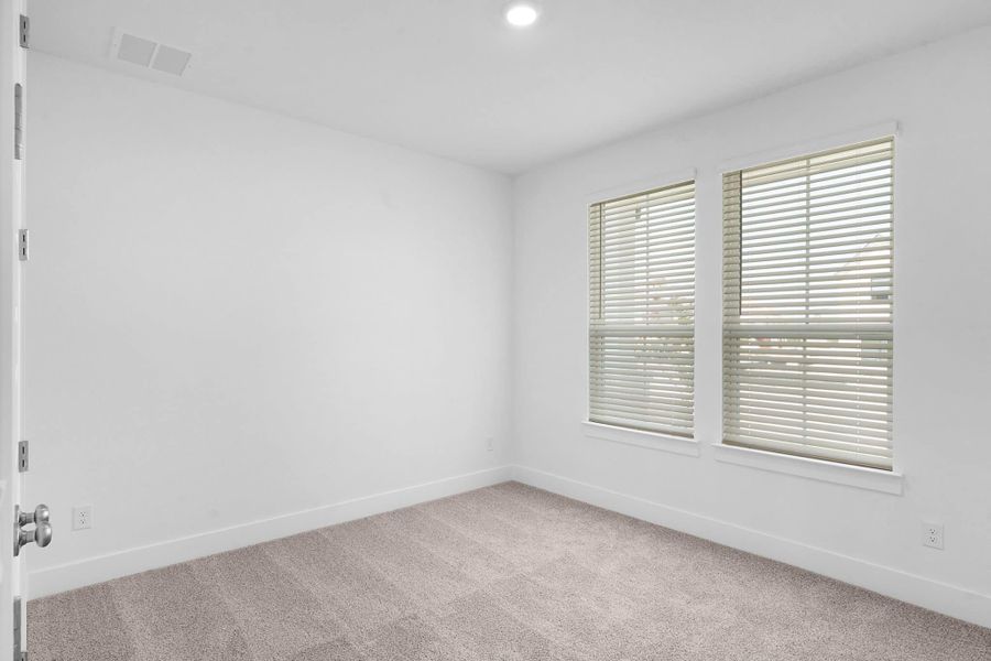 Representative unfurnished interior of a home built from the Lucas by Chesmar Homes in Parkside on the River, Georgetown (Image 10).