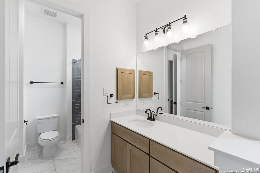 Furnished interior view inside a new home in Heimer Estates at Garden Ridge, San Antonio (Image 39).