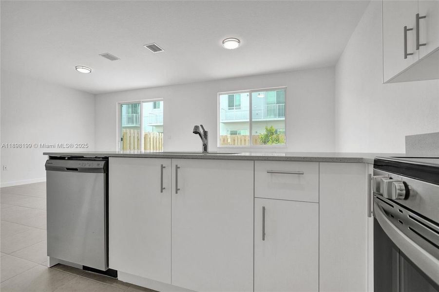 Furnished interior view inside a new home in , Homestead (Image 11). Furnished interior view inside a new home in , Homestead (Image 11).