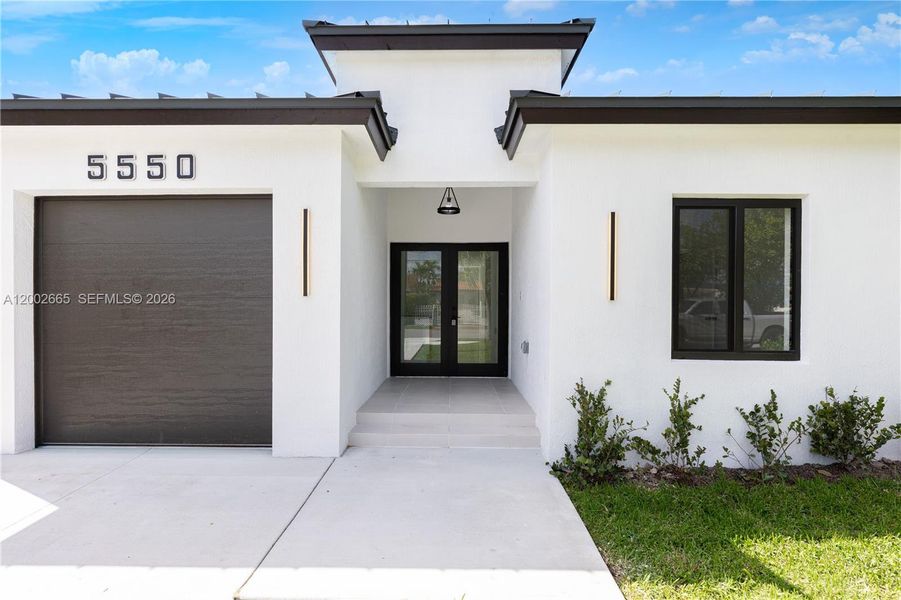 Exterior details and patio area of a home in , Miami (Image 3).