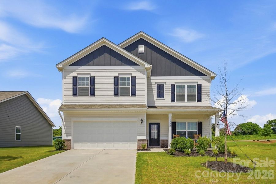 Front exterior of a new home in Pine Bluff, Midland, NC, highlighting curb appeal (Image 23).