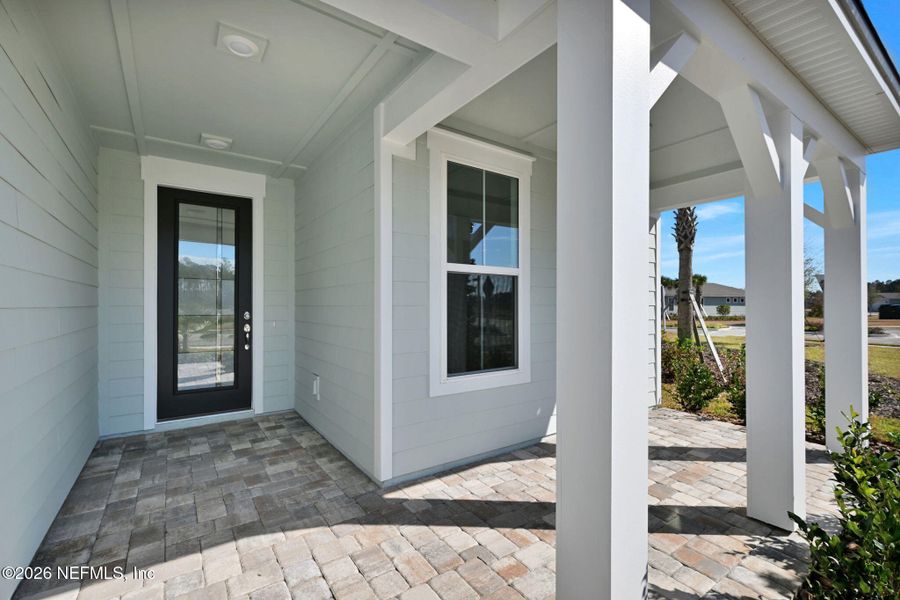 Exterior details and patio area of a home in Del Webb Wildlight, Yulee (Image 3).