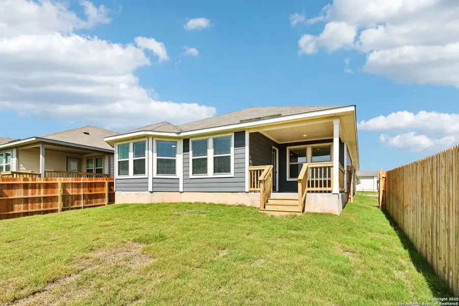 Front exterior of a new home in Catalina, Converse, TX, highlighting curb appeal (Image 1).