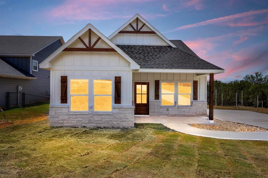 Front exterior of a new home in , Granbury, TX, highlighting curb appeal (Image 2). Front exterior of a new home in , Granbury, TX, highlighting curb appeal (Image 2).