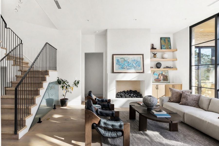 Living area featuring wood finished floors and expansive windows