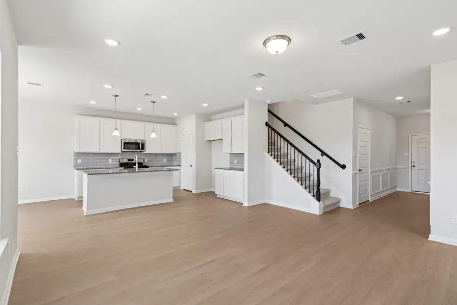 The Oriole II- Family Room into Kitchen