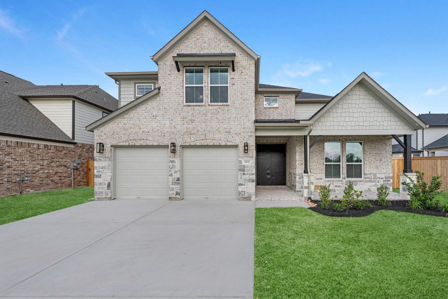 Front exterior of a new home in Morton Creek Ranch, Katy, TX, highlighting curb appeal (Image 2). Front exterior of a new home in Morton Creek Ranch, Katy, TX, highlighting curb appeal (Image 2).