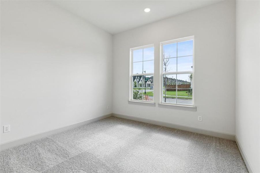 One of several nicely sized secondary bedrooms in our Frederic III plan.