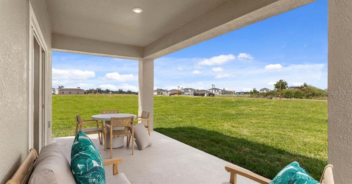 Exterior details and patio area of a home in Oakfield Trails, Parrish (Image 23).
