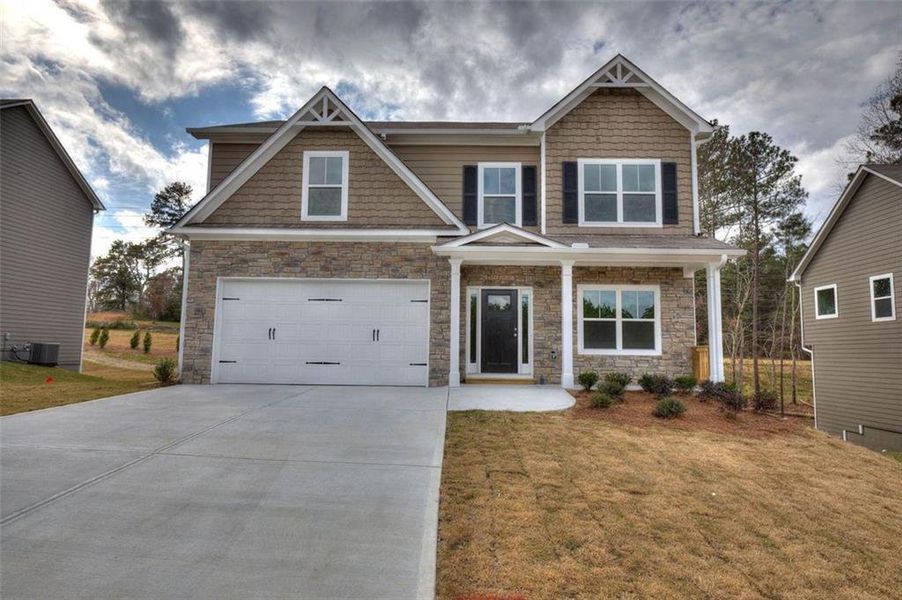 Front exterior of a new home in , Cartersville, GA, highlighting curb appeal (Image 19). Front exterior of a new home in , Cartersville, GA, highlighting curb appeal (Image 19).