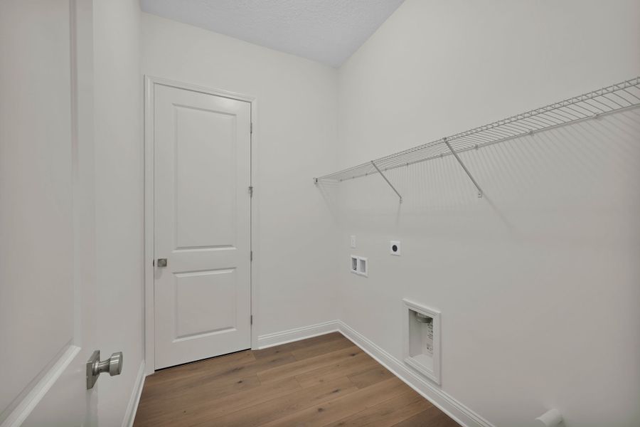 Representative unfurnished interior of a home built from the Hudson II by Riverside Homes in Hidden Creek at SilverLeaf 70' Series, St. Augustine (Image 21).