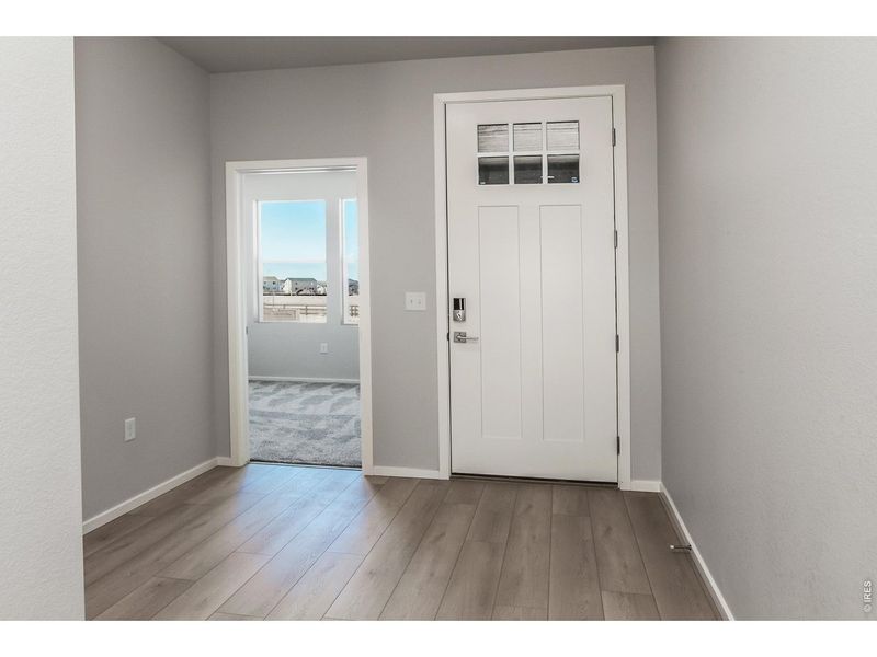 Spacious, unfurnished interior of a new home in Prairie Song Story Collection - Single Family Homes, Windsor (Image 23).