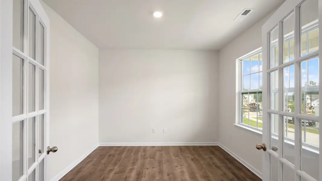 Spacious, unfurnished interior of a new home in The Reserve at Prestleigh, Wake Forest (Image 17).