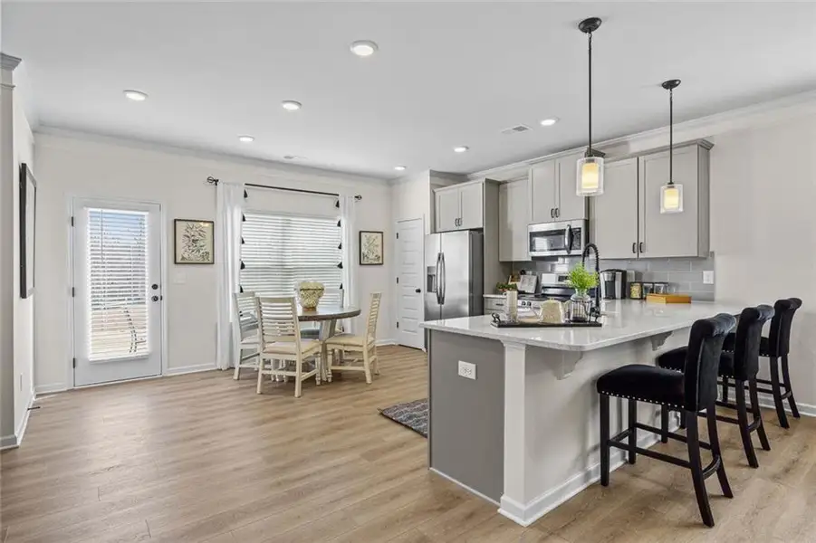 Furnished interior view inside a new home in Trinity Station, Auburn (Image 25).