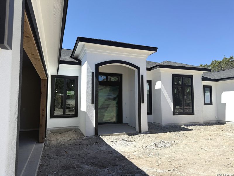 Exterior details and patio area of a home in , Spring Branch (Image 9).