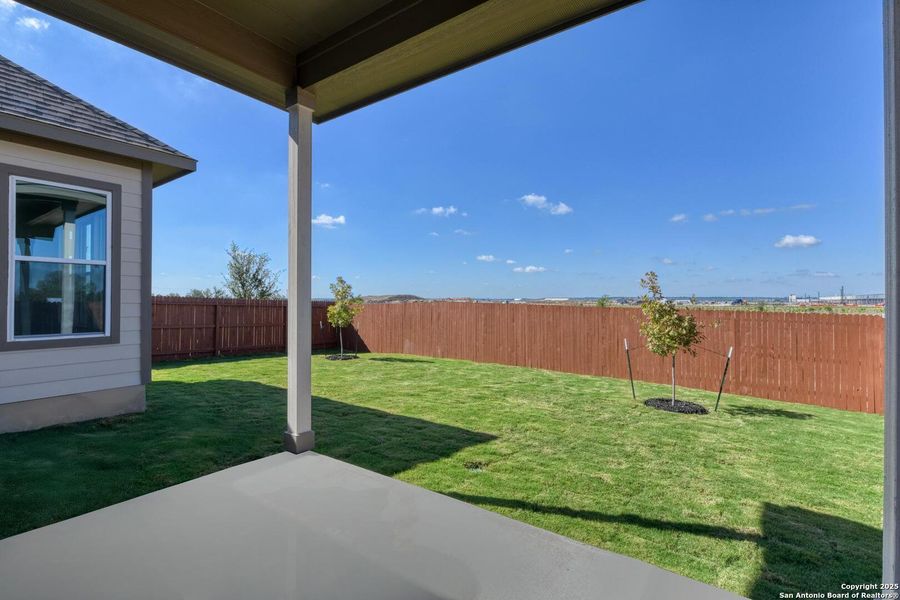 Exterior details and patio area of a home in Megan's Landing 50's, Castroville (Image 3).