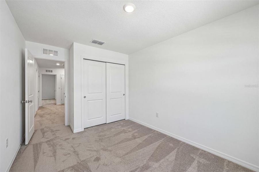 Spacious, unfurnished interior of a new home in The Towns at Tiburon, Nokomis (Image 21).