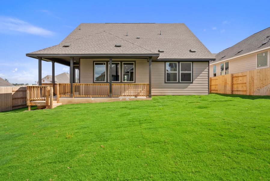 Representative exterior photo of a completed home built from the Texoma by Ashton Woods in The Colony 50s, Bastrop, TX (Image 21).