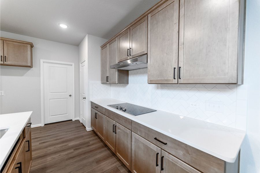 Furnished interior view inside a new home in The Woodlands at Medina Hills, Mico (Image 6).