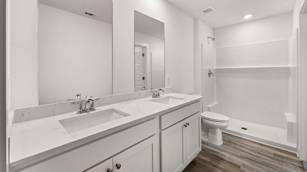 Furnished interior view inside a new home in Magnolia at the Bluffs Phase 3, Freeport (Image 7).