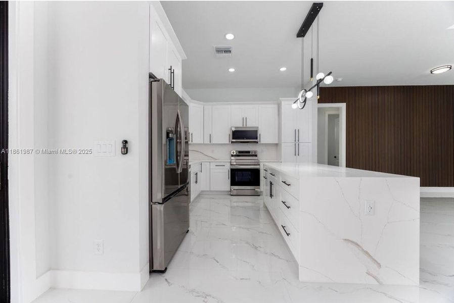 Furnished interior view inside a new home in , Lehigh Acres (Image 9). Furnished interior view inside a new home in , Lehigh Acres (Image 9).