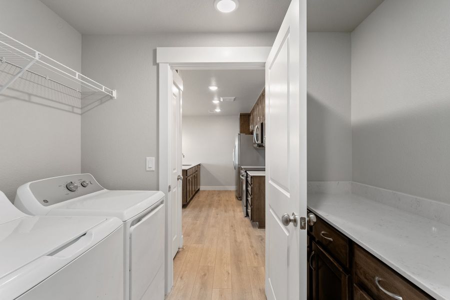 Representative furnished interior of a home built from the The Syracuse by Landmark Homes in The Lakes at Centerra, Loveland (Image 7). Representative furnished interior of a home built from the The Syracuse by Landmark Homes in The Lakes at Centerra, Loveland (Image 7).