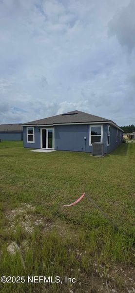 Front exterior of a new home in The Arbors, Jacksonville, FL, highlighting curb appeal (Image 29).