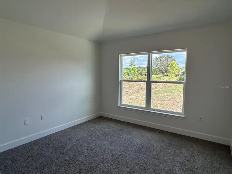 Spacious, unfurnished interior of a new home in Watercress Cove, North Port (Image 16). Spacious, unfurnished interior of a new home in Watercress Cove, North Port (Image 16).