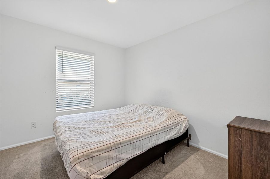 Furnished interior view inside a new home in Sunterra: Watermill Collection, Katy (Image 7).