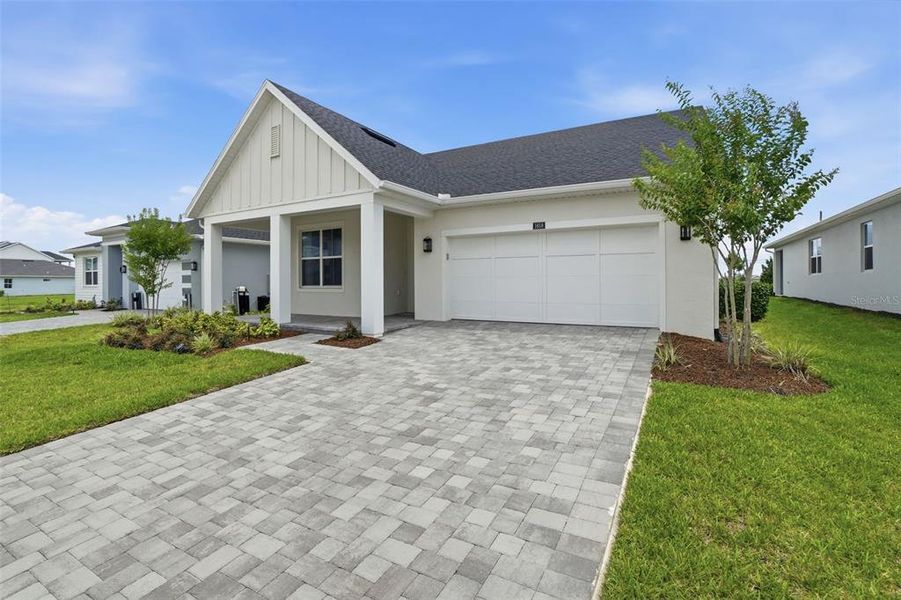 Front exterior of a new home in , Apopka, FL, highlighting curb appeal (Image 24).