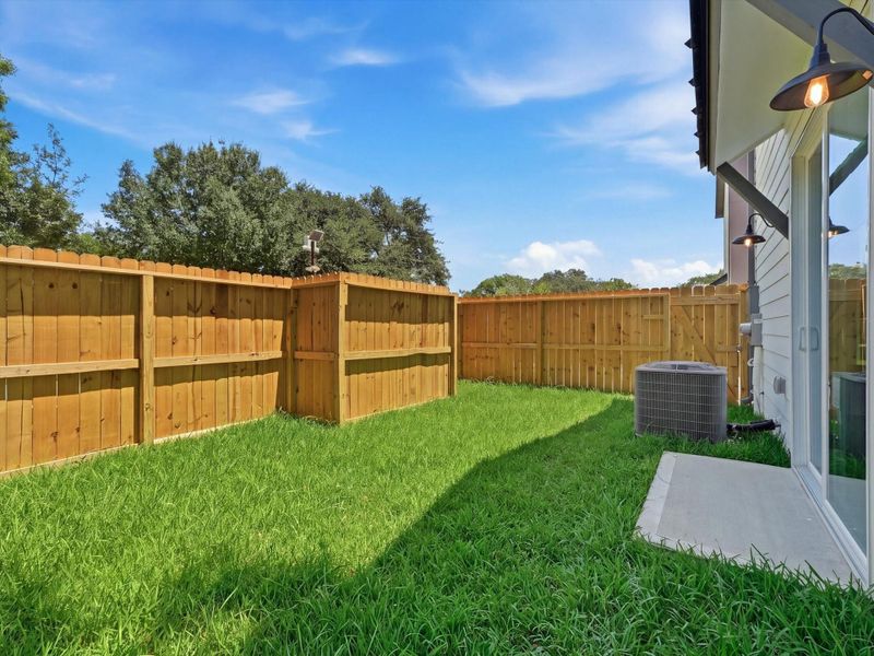 Exterior details and patio area of a home in , Houston (Image 4).