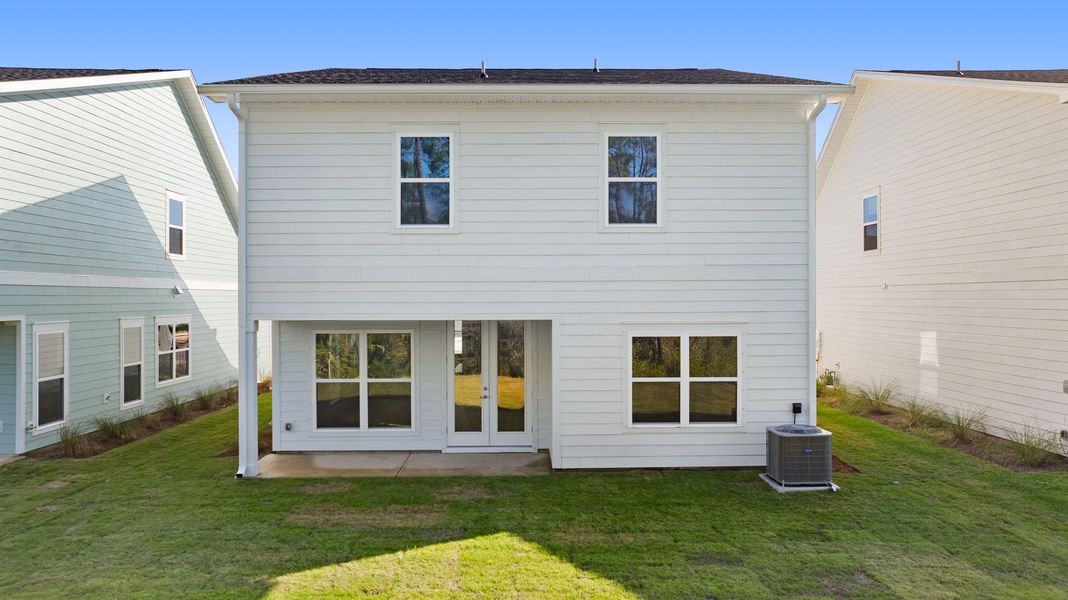 Exterior details and patio area of a home in Breakfast Point East Phase I, Panama City Beach (Image 2).