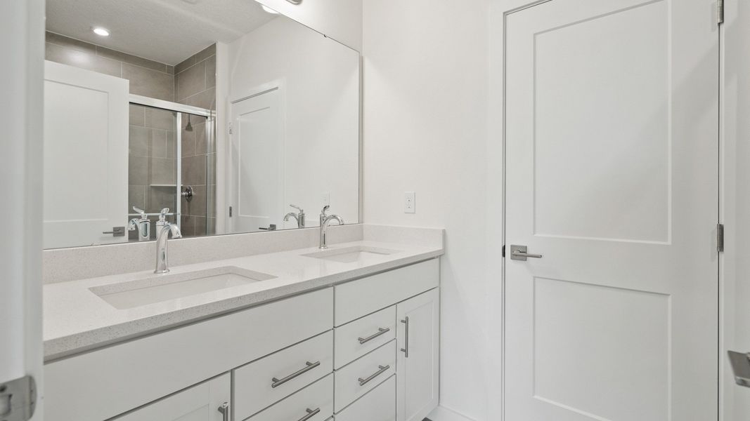 Primary En Suite Bath in the Flagler by DRB Homes in Hamilton Bluff Primary En Suite Bath in the Flagler by DRB Homes in Hamilton Bluff