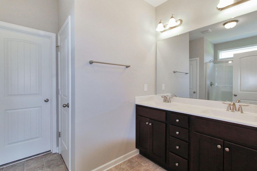 Representative furnished interior of a home built from the Nicklaus by RiverWILD Homes in Riverwood Ranch, Clayton (Image 9).