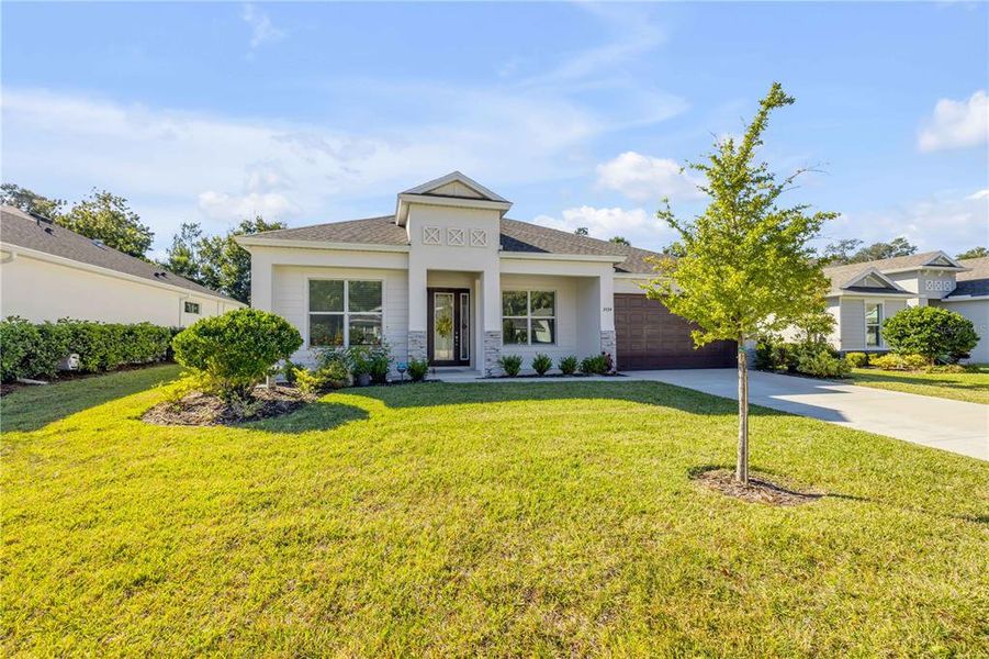 Front exterior of a new home in , Ormond Beach, FL, highlighting curb appeal (Image 1).