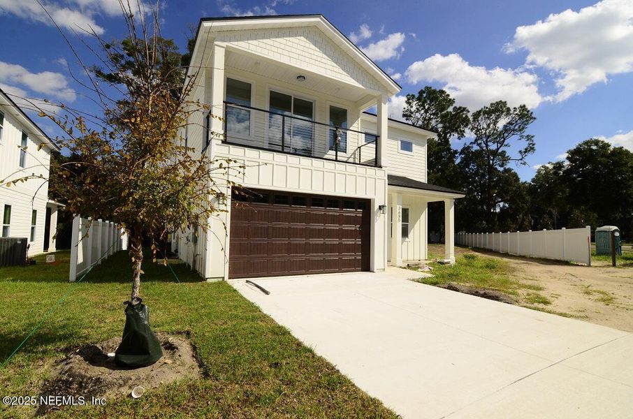 Front exterior of a new home in , Jacksonville, FL, highlighting curb appeal (Image 1). Front exterior of a new home in , Jacksonville, FL, highlighting curb appeal (Image 1).