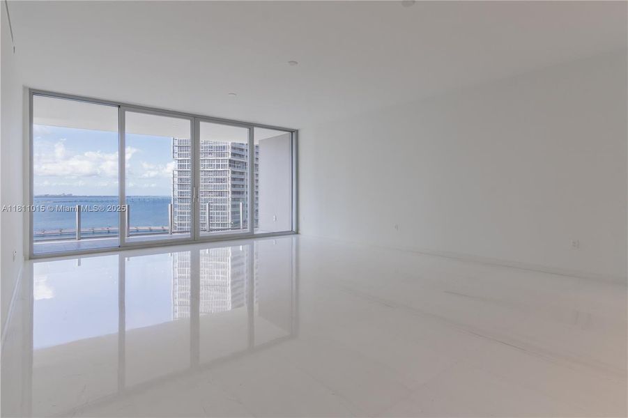 Spacious, unfurnished interior of a new home in Aston Martin Residences, Miami (Image 24).