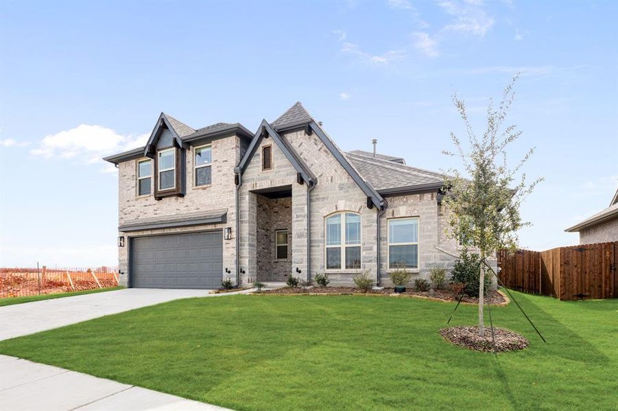 Front exterior of a new home in Ridge Ranch, Mesquite, TX, highlighting curb appeal (Image 2).