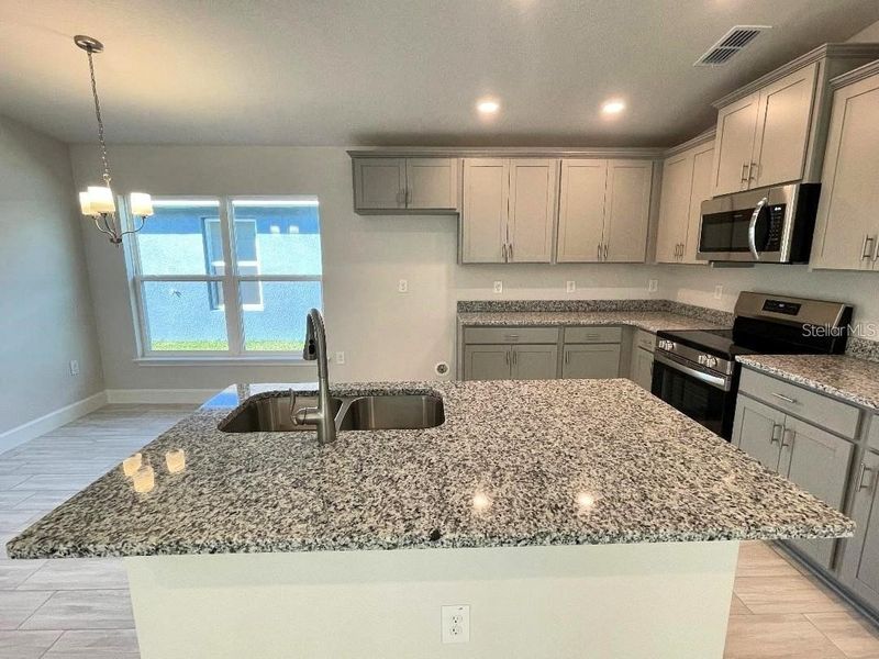 Furnished interior view inside a new home in Highland Hills, Hudson (Image 7).