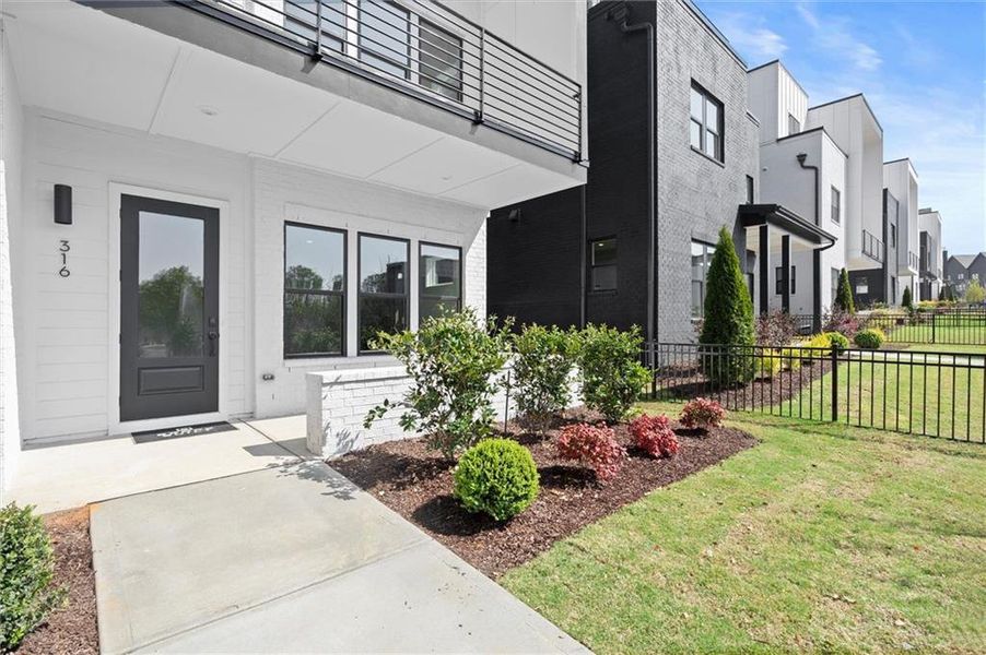 Exterior details and patio area of a home in The Gathering – Alpharetta, Alpharetta (Image 28).