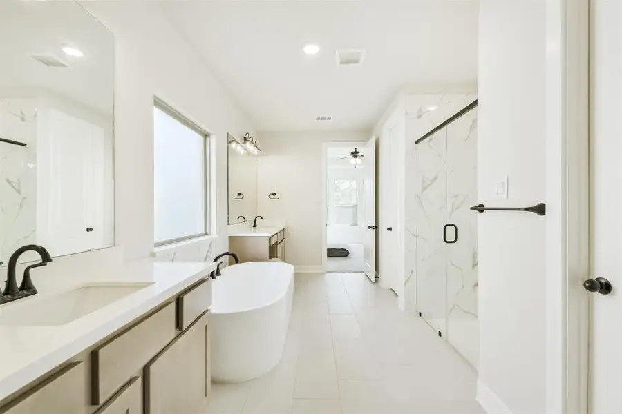 Furnished interior view inside a new home in The Woodlands Hills – 55', Willis (Image 11).