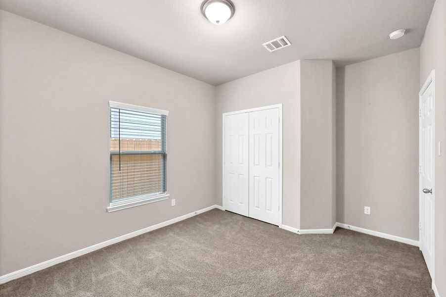 Representative unfurnished interior of a home built from the Floor Plan 1427 by Colina Homes in River Ranch, Dayton (Image 23).