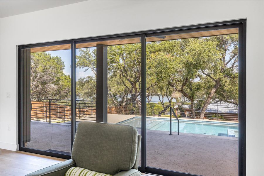 Doorway featuring plenty of natural light and wood finished floors