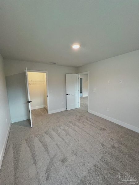 Spacious, unfurnished interior of a new home in Pine Top, Cantonment (Image 11).