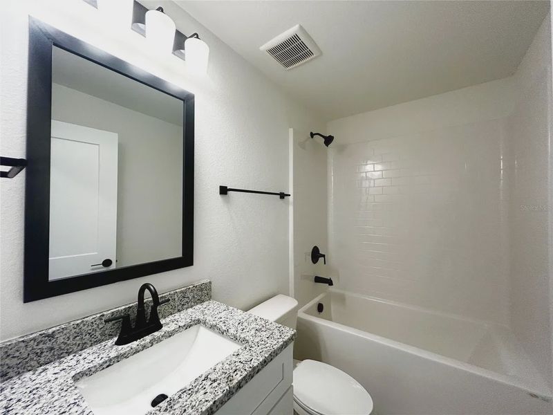 Furnished interior view inside a new home in Deep Creek, Punta Gorda (Image 10).